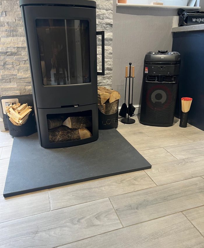 Brazilian slate hearth installed with a Termatech TT44G wood-burning stove.